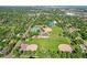 Aerial view of a park featuring baseball fields, a pool, and tennis courts, ideal for recreation at 1975 Cody St, Lakewood, CO 80215