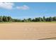 Open baseball field with well-maintained dirt and grass, perfect for sports enthusiasts at 1975 Cody St, Lakewood, CO 80215