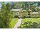 Quaint home with stone accents and a well-maintained lawn at 1975 Cody St, Lakewood, CO 80215