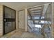 Exterior entrance features stairs, an entrance door and security door at 701 Harlan St # E72, Lakewood, CO 80214