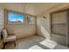 Screened-in porch featuring outdoor seating and a view of the yard at 701 Harlan St # E72, Lakewood, CO 80214