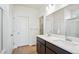 Double vanity bathroom with a walk-in shower at 1547 Orchard St, Brighton, CO 80601