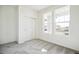 Bedroom with grey carpet and double door closet at 1547 Orchard St, Brighton, CO 80601