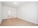 Bright home office features double doors and laminate wood flooring at 1547 Orchard St, Brighton, CO 80601