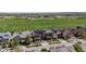An aerial view showing modern homes adjacent to expansive, well-maintained sports fields at 3734 Ridgeway St, Boulder, CO 80301