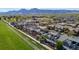 Panoramic aerial view of the neighborhood with mountain views and green sports fields at 3734 Ridgeway St, Boulder, CO 80301