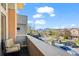 Inviting balcony offers relaxing seating and neighborhood views with mountains in the distance at 3734 Ridgeway St, Boulder, CO 80301
