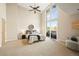 Spacious primary bedroom boasting vaulted ceilings, balcony access, and modern furnishings at 3734 Ridgeway St, Boulder, CO 80301