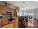 Stylish kitchen with stainless steel appliances, granite counters, and ample counter space at 3734 Ridgeway St, Boulder, CO 80301