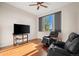 Comfortable living room area with two recliner chairs and a window with natural light at 3734 Ridgeway St, Boulder, CO 80301