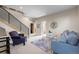 Bright living room featuring a comfortable seating arrangement and a decorative mirror at 3734 Ridgeway St, Boulder, CO 80301