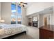 Spacious main bedroom features a fireplace, vaulted ceiling, and natural light at 3734 Ridgeway St, Boulder, CO 80301