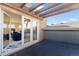 Patio with glass doors leading to an entertainment room provides seamless indoor-outdoor living at 3734 Ridgeway St, Boulder, CO 80301