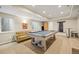Basement recreation room with pool table, wet bar, and comfortable seating offers great entertainment at 3734 Ridgeway St, Boulder, CO 80301