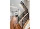 Modern staircase with sleek metal railings leading to the upper level at 3734 Ridgeway St, Boulder, CO 80301