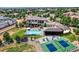 Expansive backyard featuring a pool, sport court, trampoline, and outdoor seating area at 2635 Spruce Meadows Dr, Broomfield, CO 80023