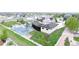 The home's exterior features a basketball court, pool, and meticulously maintained landscaping at 2635 Spruce Meadows Dr, Broomfield, CO 80023