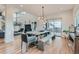 Bright dining room with access to a balcony and views of the outdoor landscape at 2635 Spruce Meadows Dr, Broomfield, CO 80023