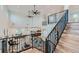 Open-concept interior showcasing the grand staircase, living area, and kitchen at 2635 Spruce Meadows Dr, Broomfield, CO 80023