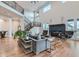 Spacious living room with wood floors, a fireplace, and a staircase leading to the upper level at 2635 Spruce Meadows Dr, Broomfield, CO 80023