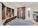 Spacious mudroom with custom built-in storage and access to the garage and other areas of the home at 2635 Spruce Meadows Dr, Broomfield, CO 80023