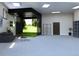 Recreation room with golf simulator, shelving, and plenty of space for entertainment at 2635 Spruce Meadows Dr, Broomfield, CO 80023