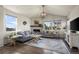 Spacious living room features a fireplace, recessed lighting, and hardwood floors at 12659 Stone Creek Ct, Firestone, CO 80504