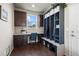 Mud room with built in storage and a desk at 12659 Stone Creek Ct, Firestone, CO 80504