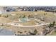 Aerial view of a community playground and park, ideal for families at 12659 Stone Creek Ct, Firestone, CO 80504