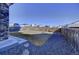 Landscaped backyard with rock features, offering a serene outdoor space at 26293 E Archer Ave, Aurora, CO 80018
