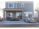 Covered patio offering outdoor dining space, perfect for entertaining with BBQ at 26293 E Archer Ave, Aurora, CO 80018