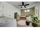 Cozy Bedroom with a wood crib, soft rug, natural light, and tranquil decor at 26293 E Archer Ave, Aurora, CO 80018