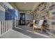 Welcoming front porch with seating, offering a cozy outdoor space at 26293 E Archer Ave, Aurora, CO 80018