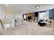 Spacious living area offering ample seating and modern decor elements for relaxation at 26293 E Archer Ave, Aurora, CO 80018