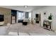 Comfortable seating area, featuring stylish decor and a large window for natural light at 26293 E Archer Ave, Aurora, CO 80018