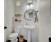 Well-lit half bathroom features modern fixtures and stylish decor at 26293 E Archer Ave, Aurora, CO 80018