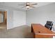 Bedroom with carpet floors, a ceiling fan, a spacious desk, and plenty of natural light at 5454 S Everett Ct, Littleton, CO 80123