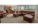 Open-concept living room flows into kitchen and dining areas at 5454 S Everett Ct, Littleton, CO 80123