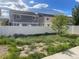 A fenced backyard featuring a freshly-sodded lawn area ideal for outdoor activities at 5537 Malta St, Denver, CO 80249