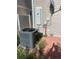 Exterior unit featuring air conditioning and electrical equipment, nestled near a brick wall at 5537 Malta St, Denver, CO 80249