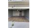 View of empty two car garage featuring a door leading to the house and overhead lighting at 5537 Malta St, Denver, CO 80249