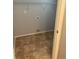 Walk-in pantry features tiled floor and shelving at 5537 Malta St, Denver, CO 80249