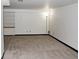 Spacious basement with carpet and built in shelves at 6150 W Mansfield Ave # 33, Denver, CO 80235