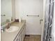 Bathroom with a single sink vanity and tiled floor and shower at 6150 W Mansfield Ave # 33, Denver, CO 80235