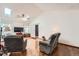 Comfortable living area with skylights and hardwood floors at 4162 S Dunkirk Way, Aurora, CO 80013