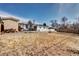 Wide backyard, shed, patio and fence at 835 Lewis Dr, Lakewood, CO 80215