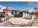 Outdoor patio and seating area, perfect for entertaining or relaxing, with a well-maintained exterior at 835 Lewis Dr, Lakewood, CO 80215