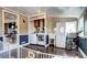 Convenient laundry area with modern appliances, ample storage, and direct access to other living spaces at 835 Lewis Dr, Lakewood, CO 80215