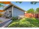 Backyard showing a green lawn, blue siding, and a seating area on the deck, perfect for relaxation at 3386 Beeler Ct, Denver, CO 80238