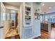 Hallway view of stylish bathroom with tiled shower, and modern fixtures at 3386 Beeler Ct, Denver, CO 80238